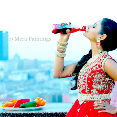 bollywood model sipping coke 1