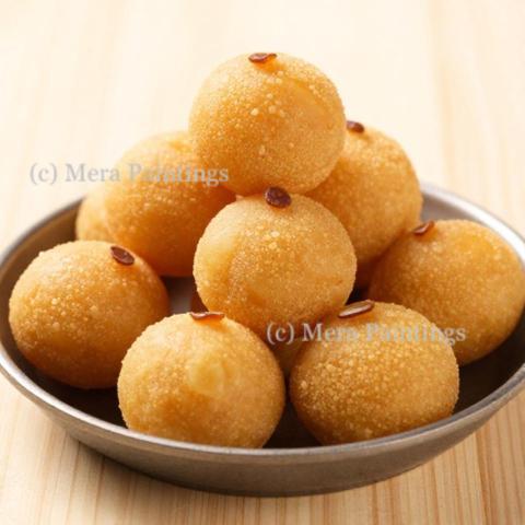 A balanced diet is a laddu in each hand