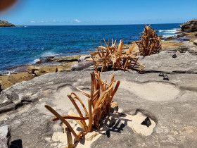 WOODEN CHAIRS LIKE SCULPTURE