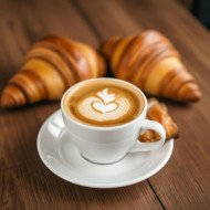 Cup of cappuccino  with croissants